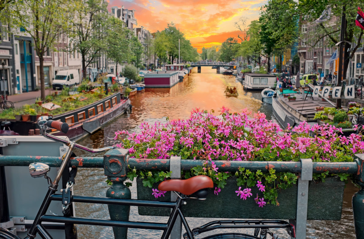 Fahrradfahren an der Prinsengracht in Amsterdam, Niederlanden